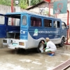 Cleaning the Church Jeep